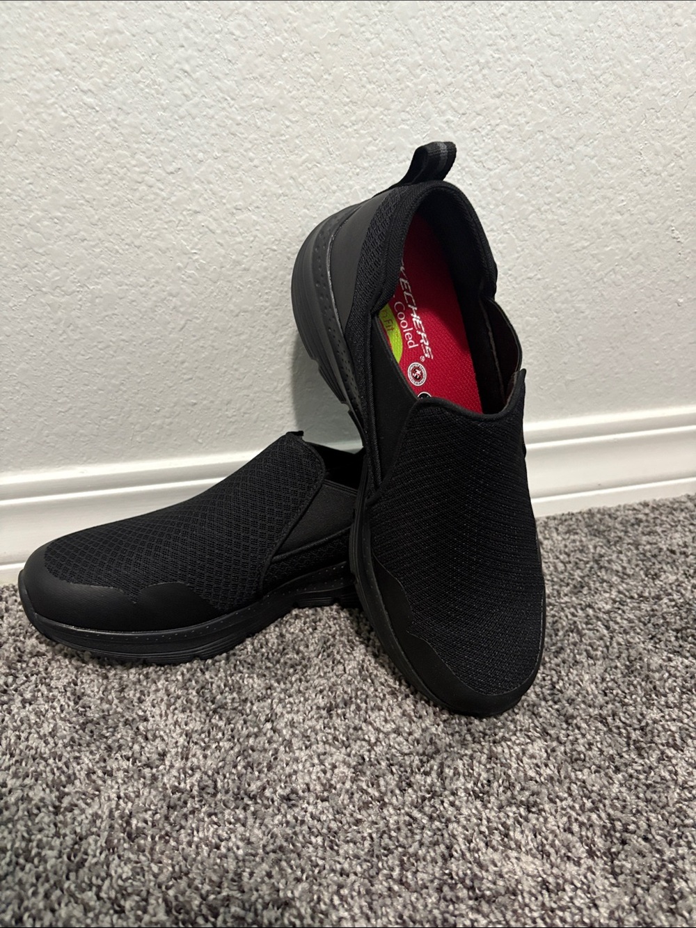 Skechers Men’s Black Slip-On Casual Loafers with Red Insole Accent